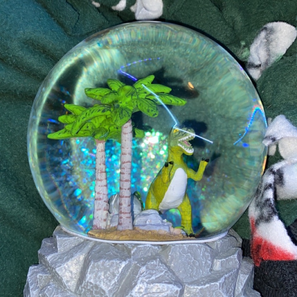 Dino snow globe